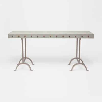 Sturdy outdoor table with concrete top and metal base, suitable for indoor or outdoor use.
