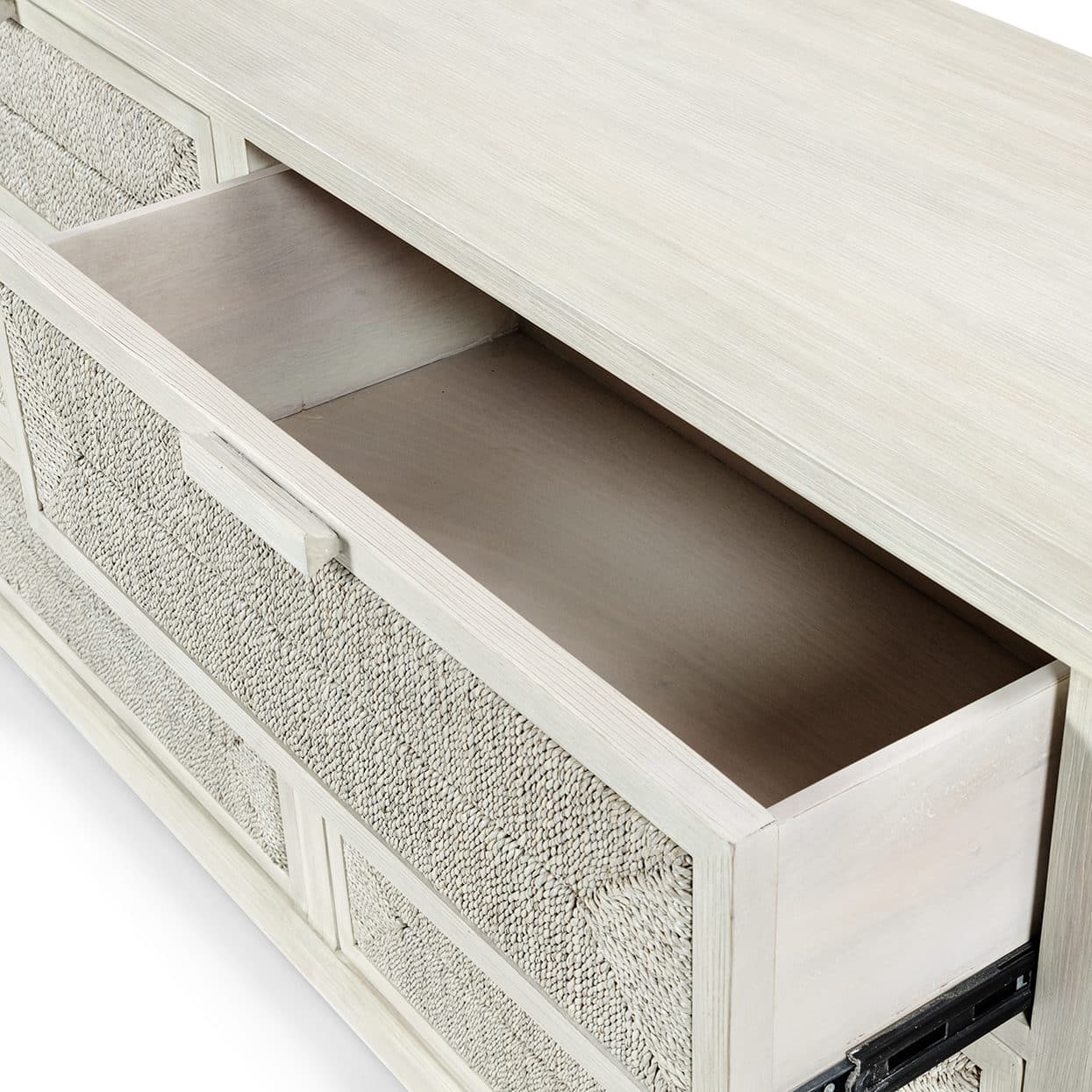Light brown Malibu rope and wood dresser with six drawers and hardwood handles