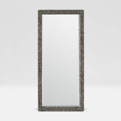 Large floor mirror with a beveled edge in natural grey shell finish, set against a dark background for contrast.