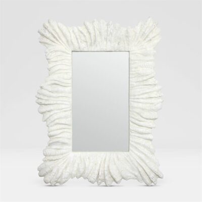 Large undulating faux coral mirror with white frame.