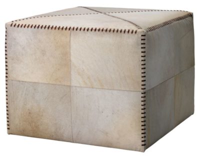 Large white cowhide square ottoman with whip stitch detail on a light background.