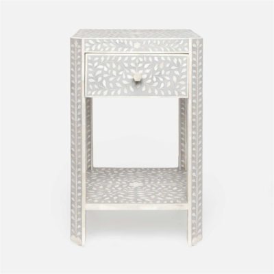White and silver nightstand with intricate inlay details.