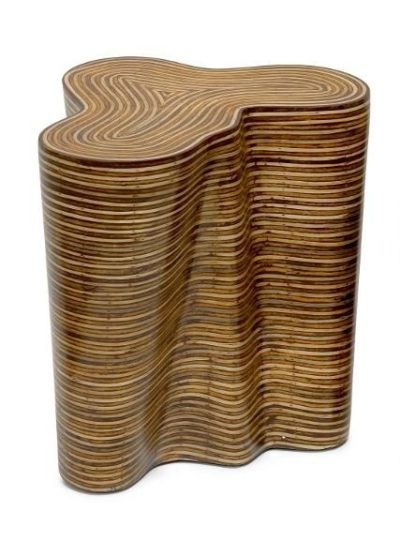 This is an image of a large side table with a unique design The table features an organic shape resembling a wave
