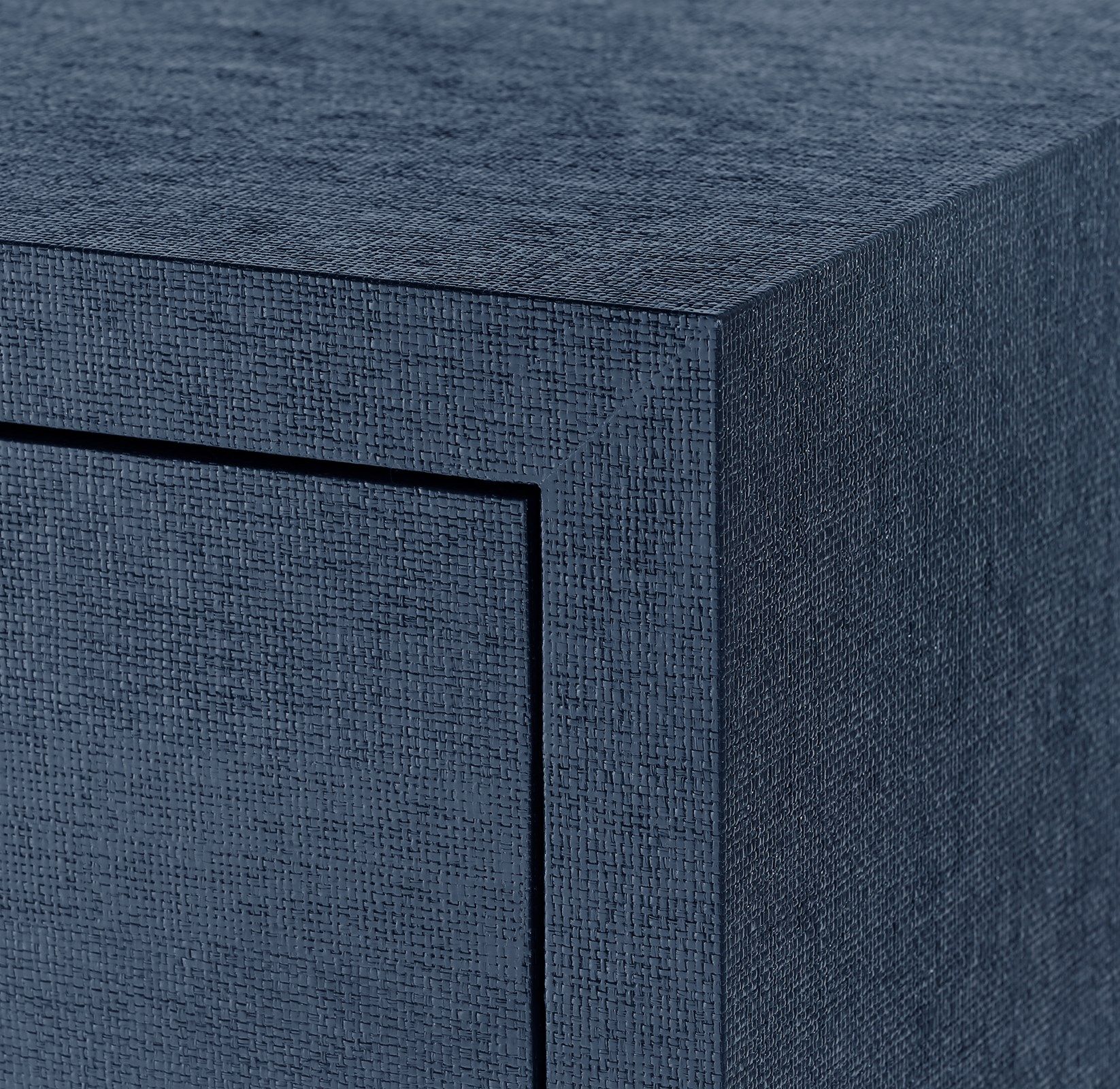 Large, rectangular dark blue dresser with six drawers and a visible texture on its surface