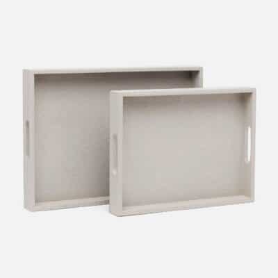 Multi-colored rectangular faux shagreen trays in French Gray, Seal Vintage, and Smoke Vintage colors, showcasing their smooth texture and elegant design.