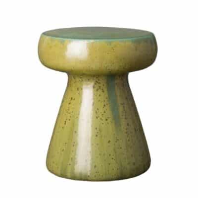 Close-up of handcrafted mushroom stool in blue, featuring unique texture and glaze variations.