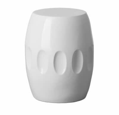 White ceramic garden stool with circular design and raised dots on outer surface, set against a neutral background.