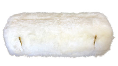 A soft, rectangular Australian sheepskin bench with gold metal legs, showcasing its plush texture and sturdy design.