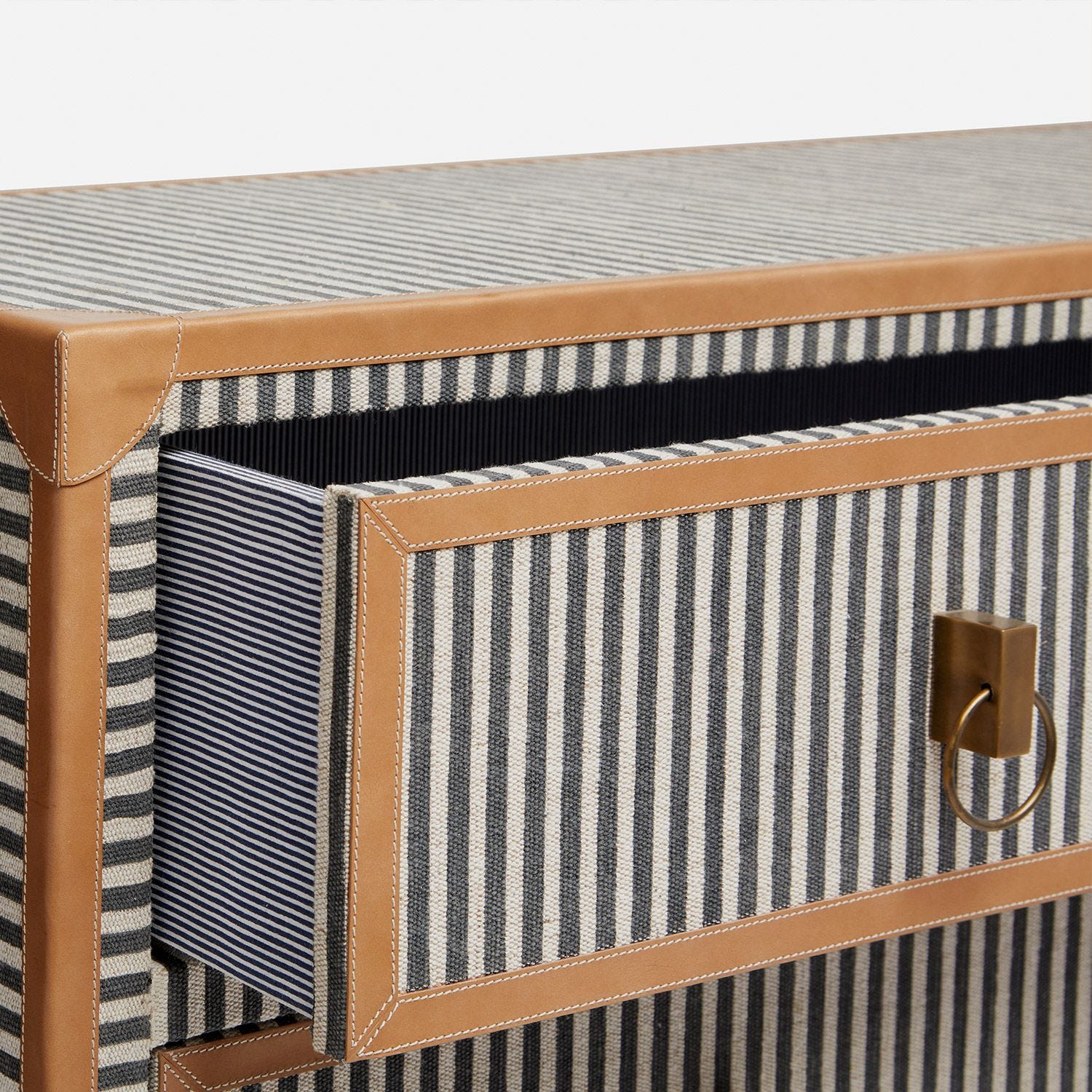 Darling Dresser in Navy and Cream Canvas Stripe, featuring three drawers and camel leather trim, handcrafted with attention to detail.