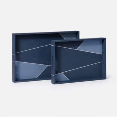 Two blue faux shagreen trays with a geometric design, displayed against a white background.