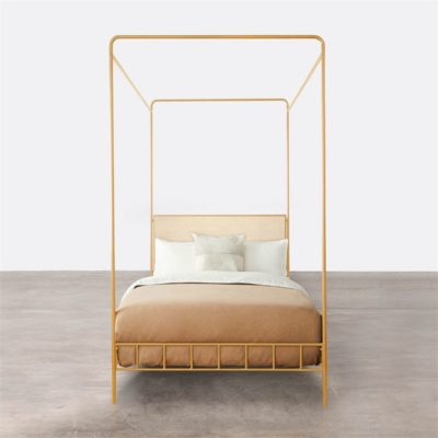 Queen Laken Bed with a distressed gold leaf finish, shown in a room with a white background and a concrete floor.