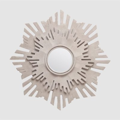 An outdoor industrial starburst mirror with a light gray reconstituted stone finish, set against a white background.