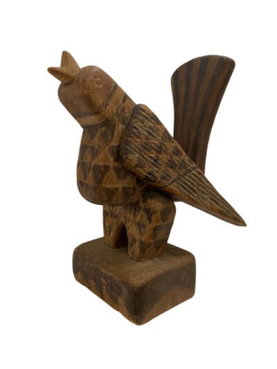 Vintage Italian bird sculpture with intricate details and painted features.
