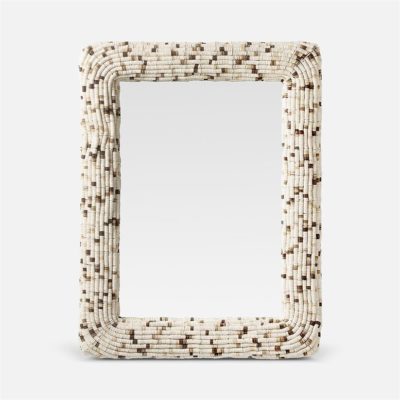 The image shows a rectangular mirror with a decorative frame featuring a pattern of light and dark beads resembling a cocoa shell