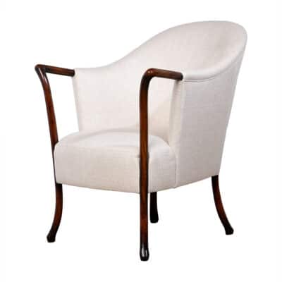 Bentwood arm chair in sable finish, featuring oatmeal woven fabric.