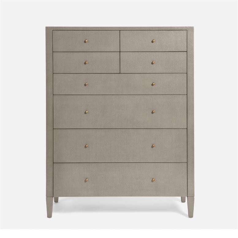 A tall, gray dresser with eight drawers against a white background.