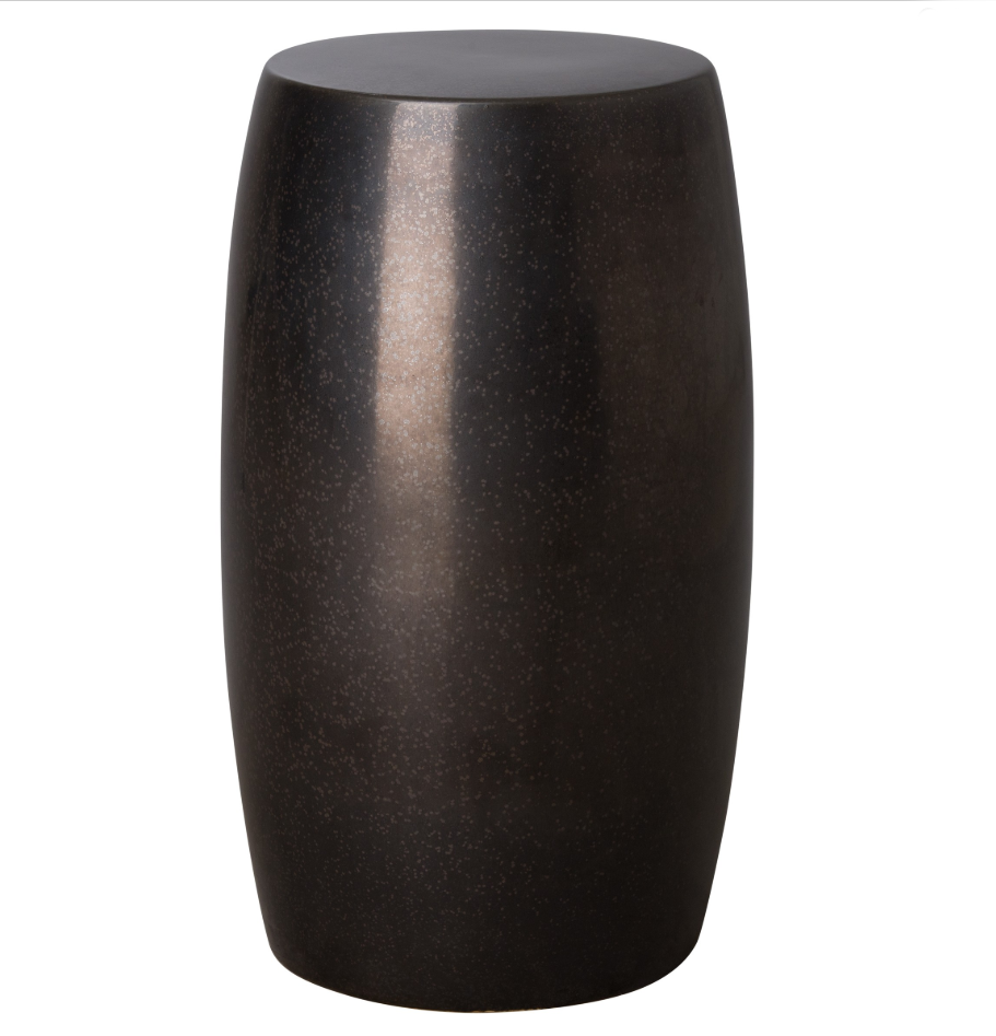 Tall ceramic garden stool with a glossy black finish, showcasing its unique texture and subtle imperfections.