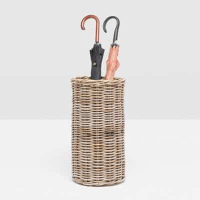 Rattan Umbrella Stand filled with colorful umbrellas, showcasing its practical use and aesthetic appeal.