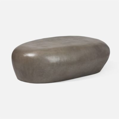 Stone coffee table with a weathered appearance featuring a reinforced concrete construction and available in light grey or black finishes The table