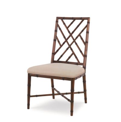 A wooden dining chair with a beige seat, exhibiting an elegant design with slats on the backrest and a sturdy structure.