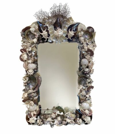 Rectangular mirror with intricate shell and coral design.