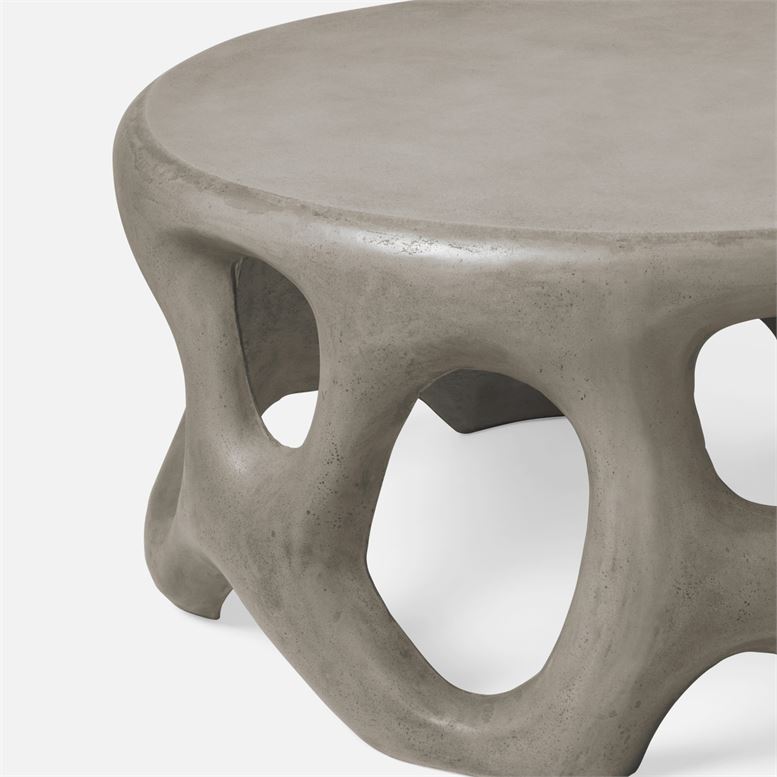Outdoor Sculpted Concrete Coffee Table in Smooth Grey.