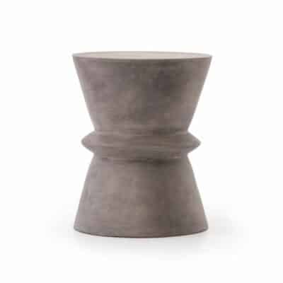 Dark grey concrete stool with four legs and an open top.