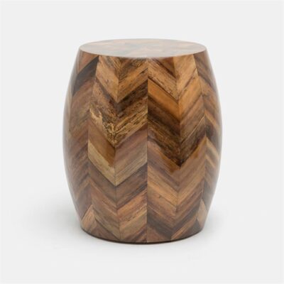 Barrel-shaped stool in natural banana bark with starburst pattern.