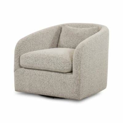 Cream-colored plush upholstered swivel chair with curved arms and a single hidden pillow at the base designed for comfort and style in