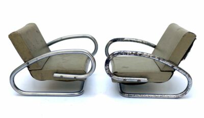 Two vintage model Bauhaus chairs from Czechia circa 1960 The chairs are made of metal with a grey finish and have a