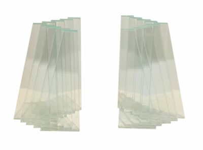 A pair of clear glass bookends from the Ritts Glass Company evoking a vintage aesthetic reminiscent of the 1980 s The bookends