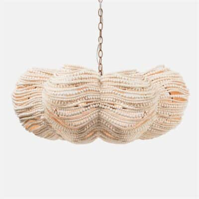 Large, beaded chandelier in a clover shape.