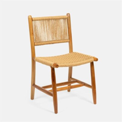 A Danish style dining chair with a teak frame and a natural woven fiber seat and back.