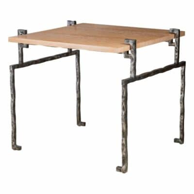 A side table with a rectangular top and metal legs, featuring a rustic design with a combination of wood and iron materials.