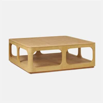 Square coffee table with raffia and cane design, featuring a matte natural finish.