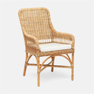 Natural wicker chair with a white cushion and stylish arches, presented against a plain background.