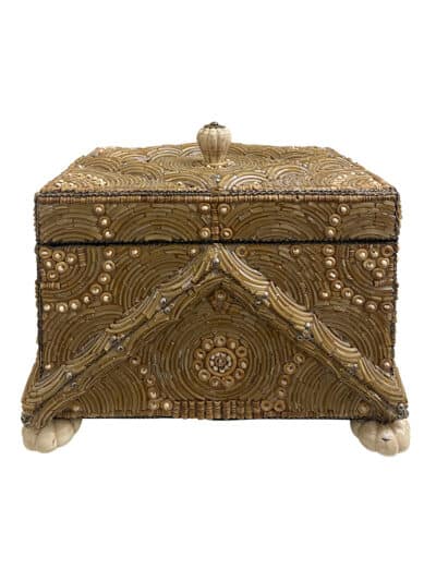 The image displays an ornate, vintage beaded glam box with intricate designs.