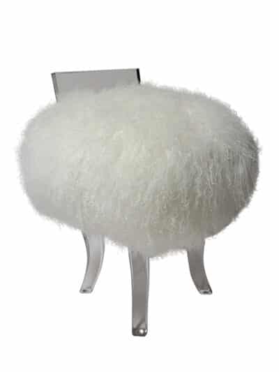 Round, white Tibetan swivel vanity stool with lucite legs and back, covered in fluffy white fur material.