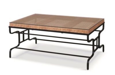 A rustic coffee table with a black metal frame and a woven cane top, featuring a lay-on glass surface.