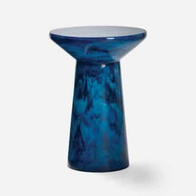 A round translucent resin accent table showcasing a unique hourglass shape available in various colors including cobalt marigold dark teal sand onyx
