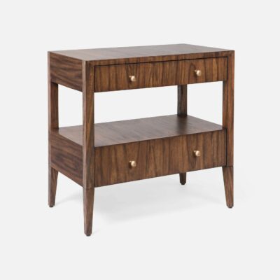 A large, rustic wooden nightstand with abstract brass knobs.
