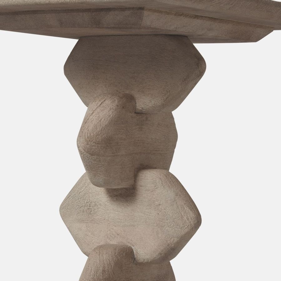 Handcrafted mango wood accent table in dark rustic finish, showcasing intricate design details.