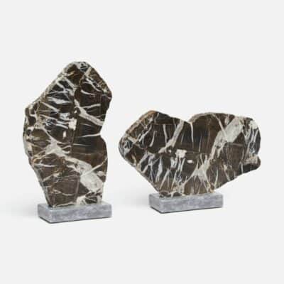 Large Nero Marble Sculpture on display, showcasing its elegant design and rich colors.