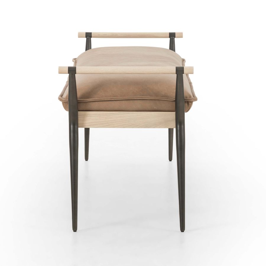 Slim oak bench with black metal legs and tan leather seat, showcasing its modern design and sturdy frame.