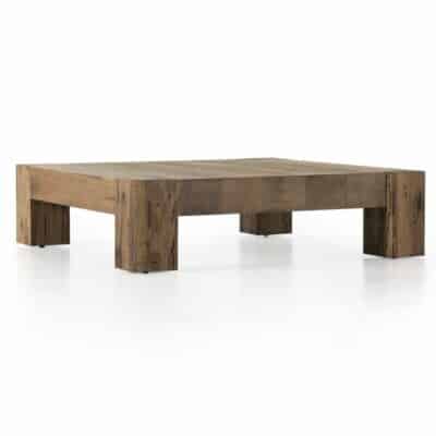 Square coffee table in rustic oak with chunky legs and dovetail joinery, front view.