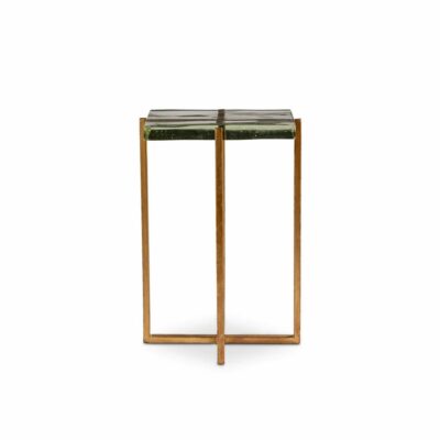 Close-up front view of a glass topped side table with gold iron base, showcasing its elegant design.