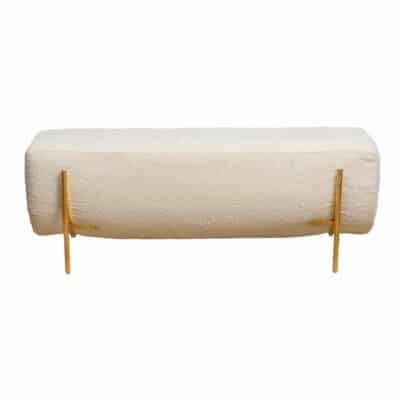Boucle bench with off-white upholstery and gold textured iron frame.