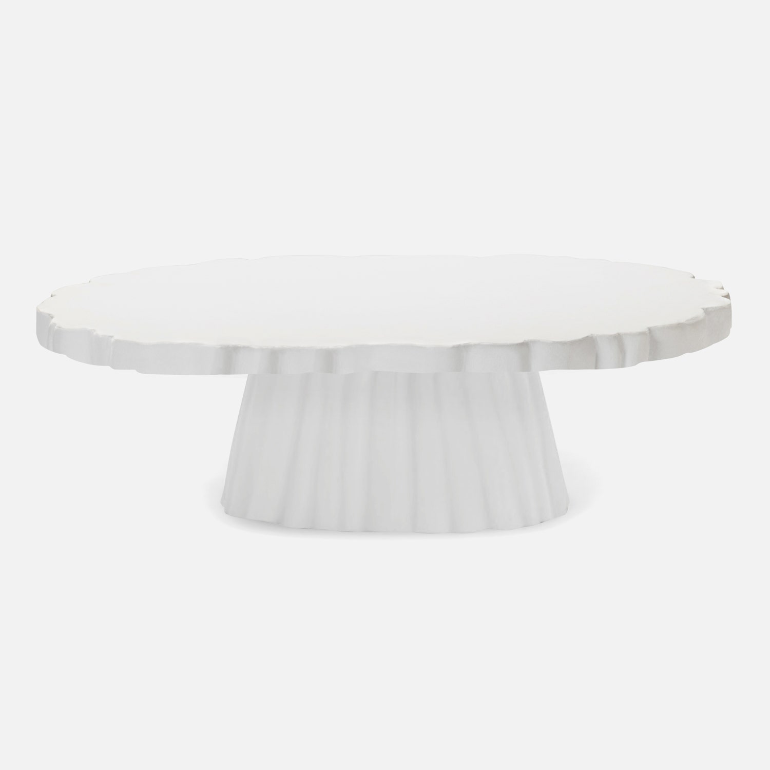 Large round scalloped coffee table in white plaster, perfect for outdoor spaces.