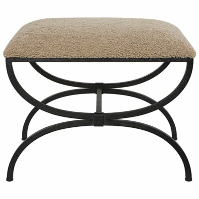 Textured faux shearling seat atop an aged black iron base