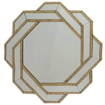Close-up of Clear and Gold Octagonal Eglomise Mirror with intricate gold leaf design and etched gilt patterns.